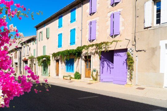 Fototapeta beautiful old town street, houses with colorful shutters in Provence , France