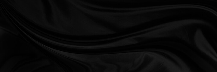 Black gray satin dark fabric texture luxurious shiny that is abstract silk cloth panorama...