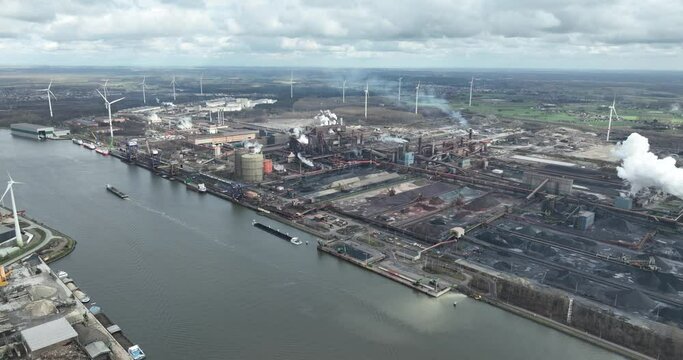 Steel production factory and blast furnace. Aerial drone view made in Ghent, Belgium. Metal production.