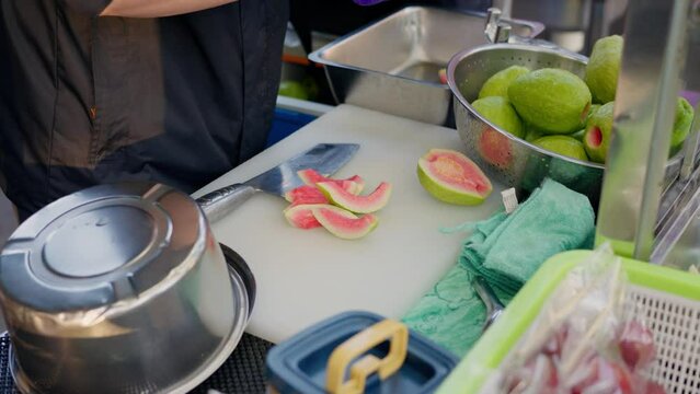 Cut slice of guava in street market of Taipei