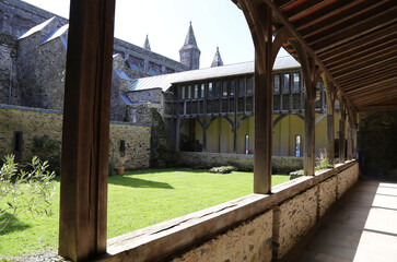 The quiet, sunny courtyard within the cathedral complex at St. David's, Pembrokeshire, Wales, UK.