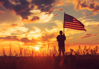 Young Boy Holding American Flag at Sunset in Field