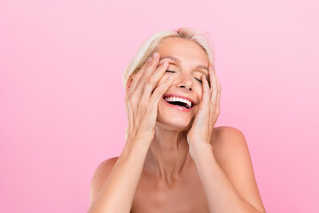 Photo of lovely dreamy retired lady naked shoulders washing face exfoliation peeling effect young...