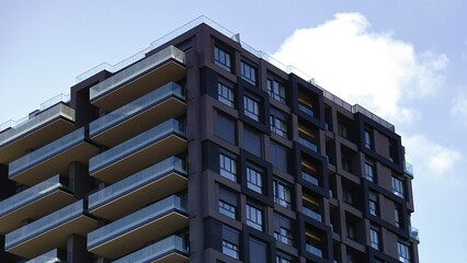 corner of residential building facade modern against the sky