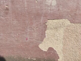 Fototapeta premium The texture of an old cracked plastered wall. Gray old wall. Rough texture
