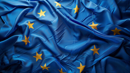 Vibrant textured European Union flag waving gracefully in the wind - obrazy, fototapety, plakaty
