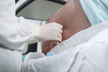 Injections of spinal anesthesia.Injections of epidural anesthesia in preparation for vascular...
