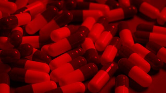 Medical Capsules Pills Pour Out Dangerous Drugs Concept
