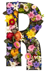 Letter R made of real natural flowers and leaves on white background isolated.