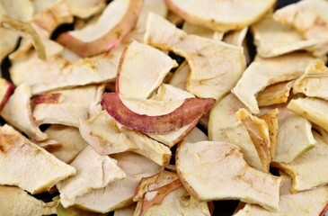 Homemade dried organic apple slices. Full frame, background and texture.