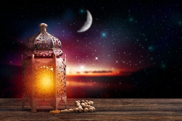 Colorful beautiful Ramadan lantern at Crescent moon background