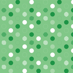 Green geometric seamless pattern with green and white dots