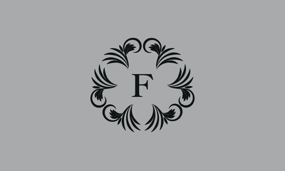 Elegant floral monogram design template for one or two letters such as F. Business sign, identity monogram for restaurant, boutique, hotel, heraldic, jewelry