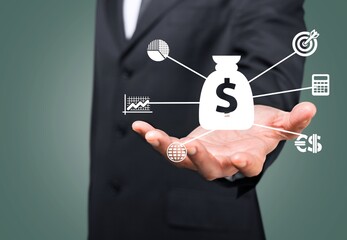 Businessman or trader hold icon of business finance