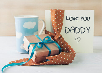 Father's day concept card,gift box ,beverage and tie. Male accessories. Greeting template with message.