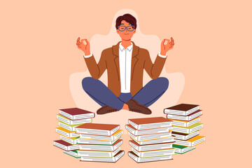 Man does yoga and meditation, taking break from reading books, levitating in lotus position to restore energy. Guy will become interested in yoga practices that help maintain good mental health