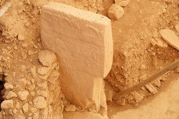 Pillar 43 in Enclosure D at the neolithic archaeological site of Göbekli Tepe, Potbelly Hill, a t-shaped pillar showing a bird, vulture, also called the Vulture Stone, close to Sanliurfa, Turkey © Anja