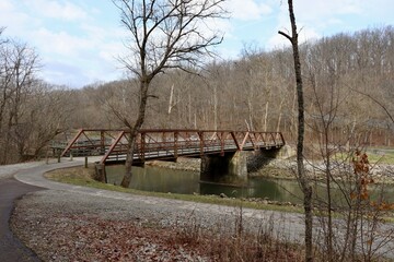 The old steel footbridge in the park.