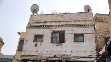 Satellite dishes on the top of a building in Fes, Morocco