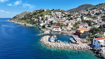 Fototapeta na wymiar Aerial drone photo of small picturesque seaside village and harbour of Kaminia located near main village of Hydra island accessible by footpath, Saronic gulf, Greece
