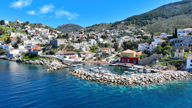 Aerial drone photo of small picturesque seaside village and harbour of Kaminia located near main village of Hydra island accessible by footpath, Saronic gulf, Greece