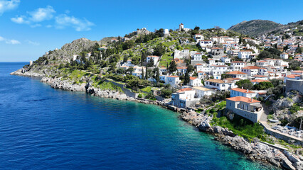 Fototapeta na wymiar Aerial drone photo of small picturesque seaside village and harbour of Kaminia located near main village of Hydra island accessible by footpath, Saronic gulf, Greece