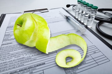 Healthy food. fresh apple at doctor dietician office
