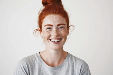 Close-up portrait of a serene redhead woman with freckles and a contented smile