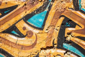 Detail of graffiti painted on the wall of a ruin in Portugal