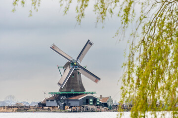 Fototapeta premium Zaanse Schans, old traditional mills, Zaanstad Municipality, European Route of Industrial Heritage, Netherlands