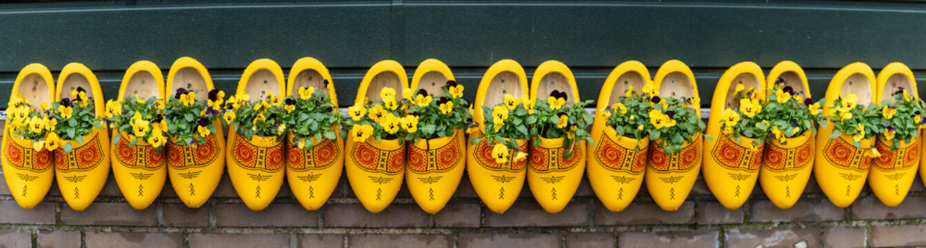 traditionally decorated yellow clogs, Zaanse Schans, Zaanstad Municipality, European Route of Industrial Heritage, Netherlands