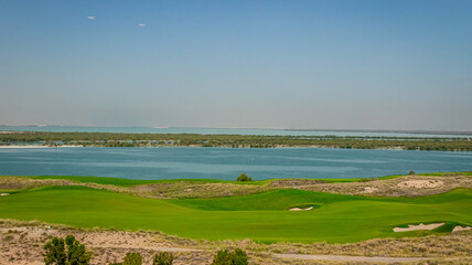 landscape with river, Yas island Abu Dhabi view, golf club during daytime