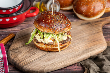 hamburger on a wooden table