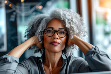 Fototapeta premium A woman with a gray head of hair