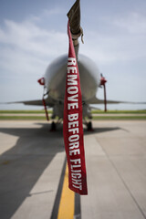 Remove before flight ribbon safety on a fighter jet - 791981900