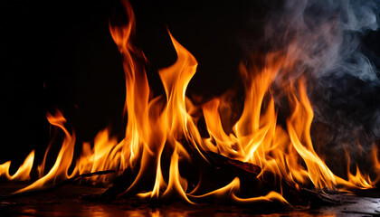 Close-up of fire flames on black background. Intense blaze.