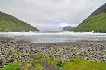 Fototapeta na wymiar View of Tjørnuvík (Danish: Tjørnevig) bay - the northernmost village on Streymoy in Sunda Municipality, Faroe Islands.
