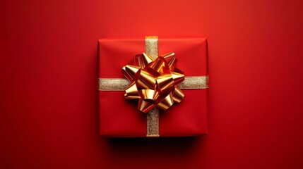 Elegant Red Gift Box with Golden Ribbon on a Festive Red Background