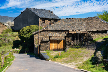 Stone houses with brick roofs on the north mountain of Guadalajara, Majaelrayo.