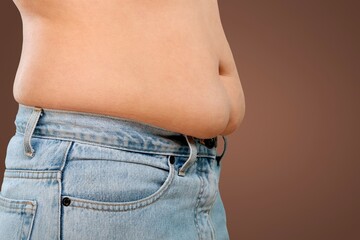 Naklejka premium Overweight person with fat on belly, losing weight