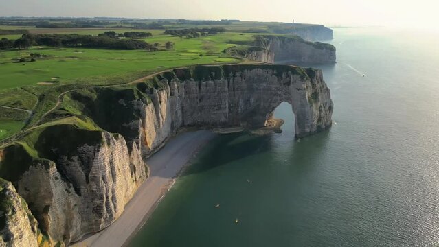 Aerial view of the Etretat, France chalk cliffs during a sunny day
