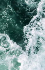 Fototapeta premium Top view of rough sea and waves on green background.