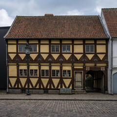 Østerbyes Gård is a yellow half timbered house from 1631 in Odense, Denmark