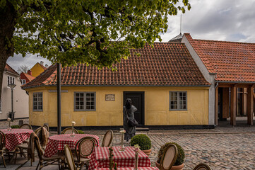tourist taking a photo at H. C. Andersens House in Odense