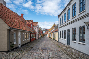 cobblestone street leading up to Hans Christian Andersen's house in Odense