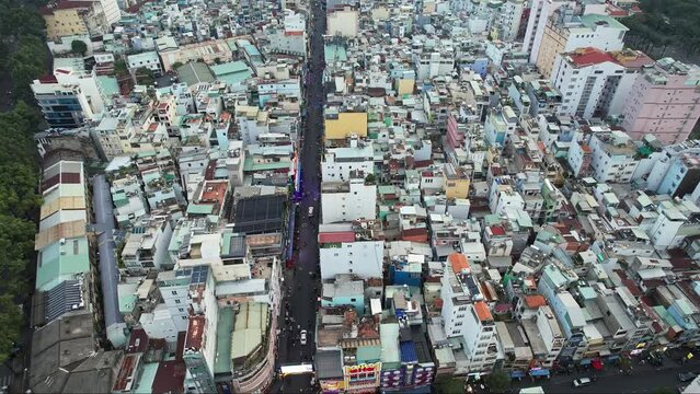 Urban landscape with skyscrapers, buildings, and trees in the 4K Ho Chi Minh City Bui Vien Street Vietnam