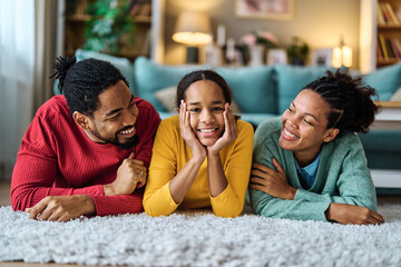 mother mom father child daughter fun family man girl teenager teen  happy together happiness black african american bonding parent love young