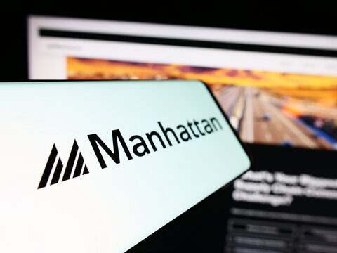 Stuttgart, Germany - 04-10-2024: Cellphone with logo of US software company Manhattan Associates Inc. in front of business website. Focus on left of phone display.