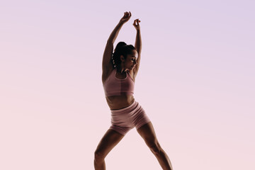 Graceful movement in the studio: Professional dancer showcase her artistic ballet technique