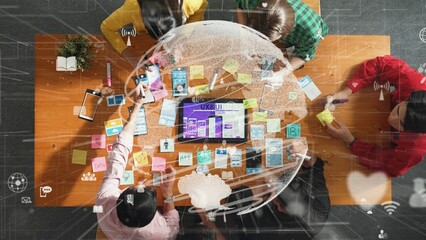 Top aerial view of skilled business team working together to design Ux Ui designing. Group of...
